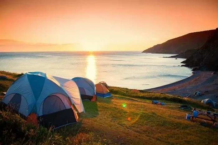 Tourists camp overnight on Ky Co beach
