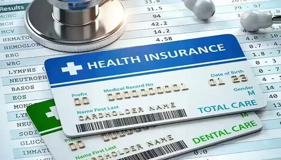 What benefits are available for medical examination and treatment while waiting for a health insurance card?