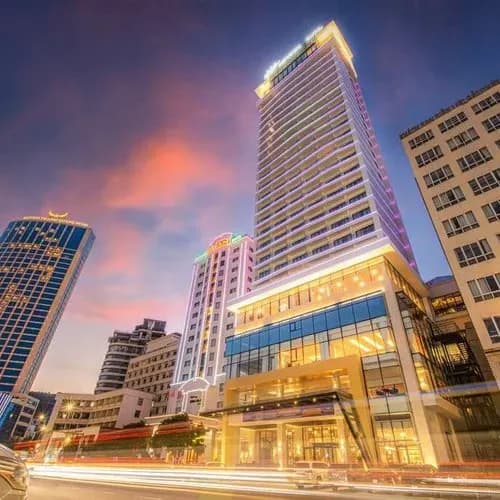 Soleil Ha Long Hotel shines brightly at night with its modern high-rise architecture.