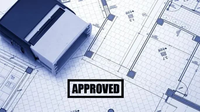 Who has the authority to decide and approve land use planning and plans in Vietnam?