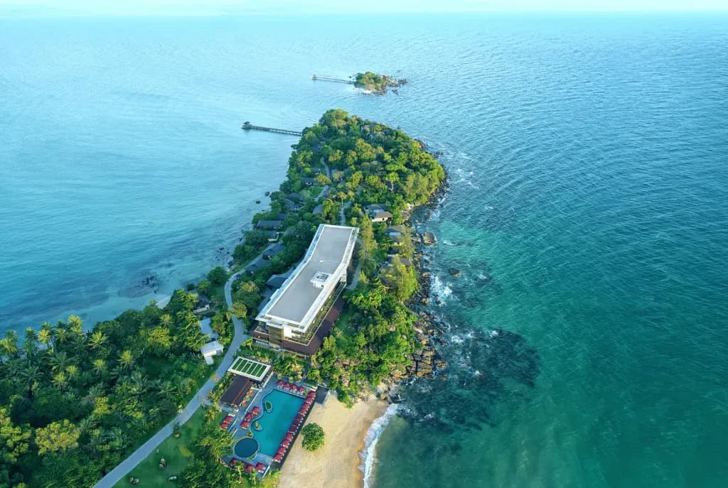 Explore the unique charm of Nam Nghi Coral Peninsula from above, immersed in vast ocean.