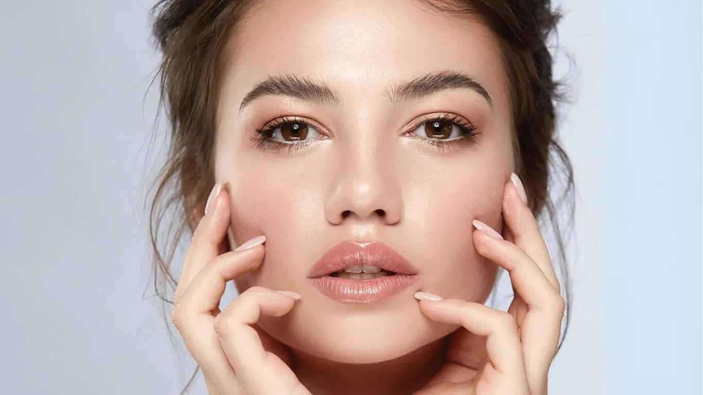 A young woman receiving professional skincare treatment at a modern beauty clinic in Vietnam, with advanced technology and personalized care.