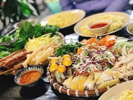 A tempting chicken salad and spring rolls spread, a highlight at Tuy Hoa Market.