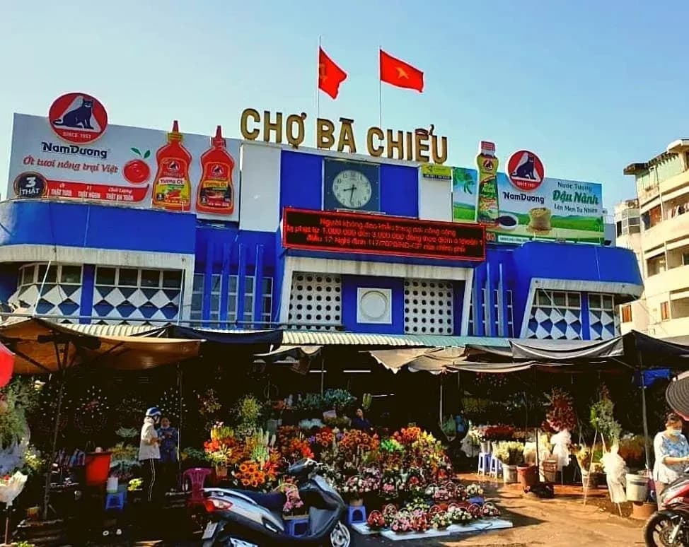 Chợ Bà Chiểu in Saigon stands out with its unique blue entrance and prominent signage.