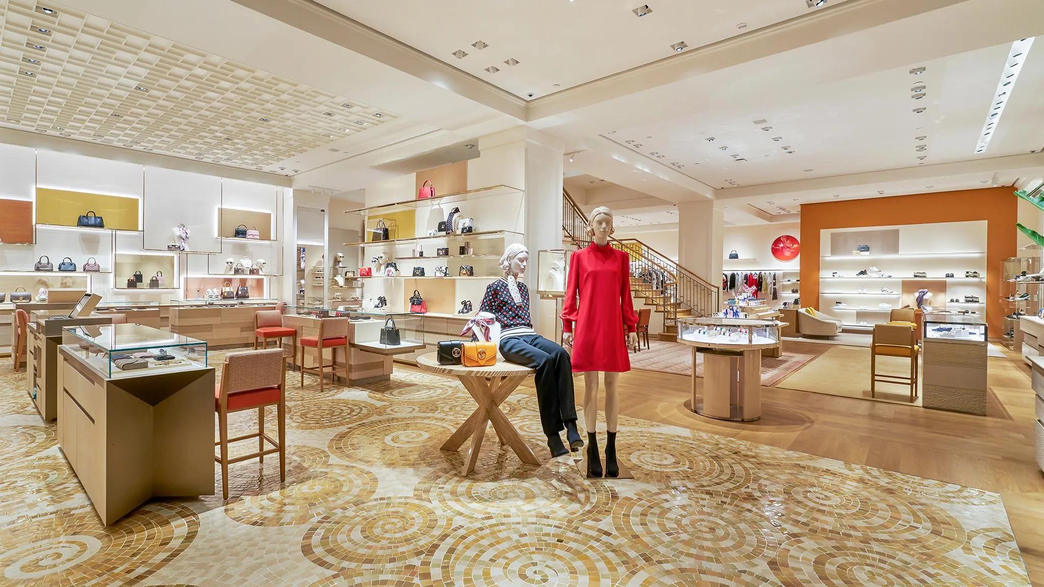 The Louis Vuitton store in Hanoi, showcasing its elegant façade and high-end luxury goods, set in the vibrant shopping district of the city