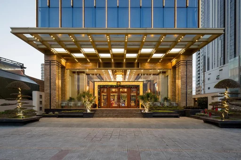 The hotel entrance exudes luxury and modern design.