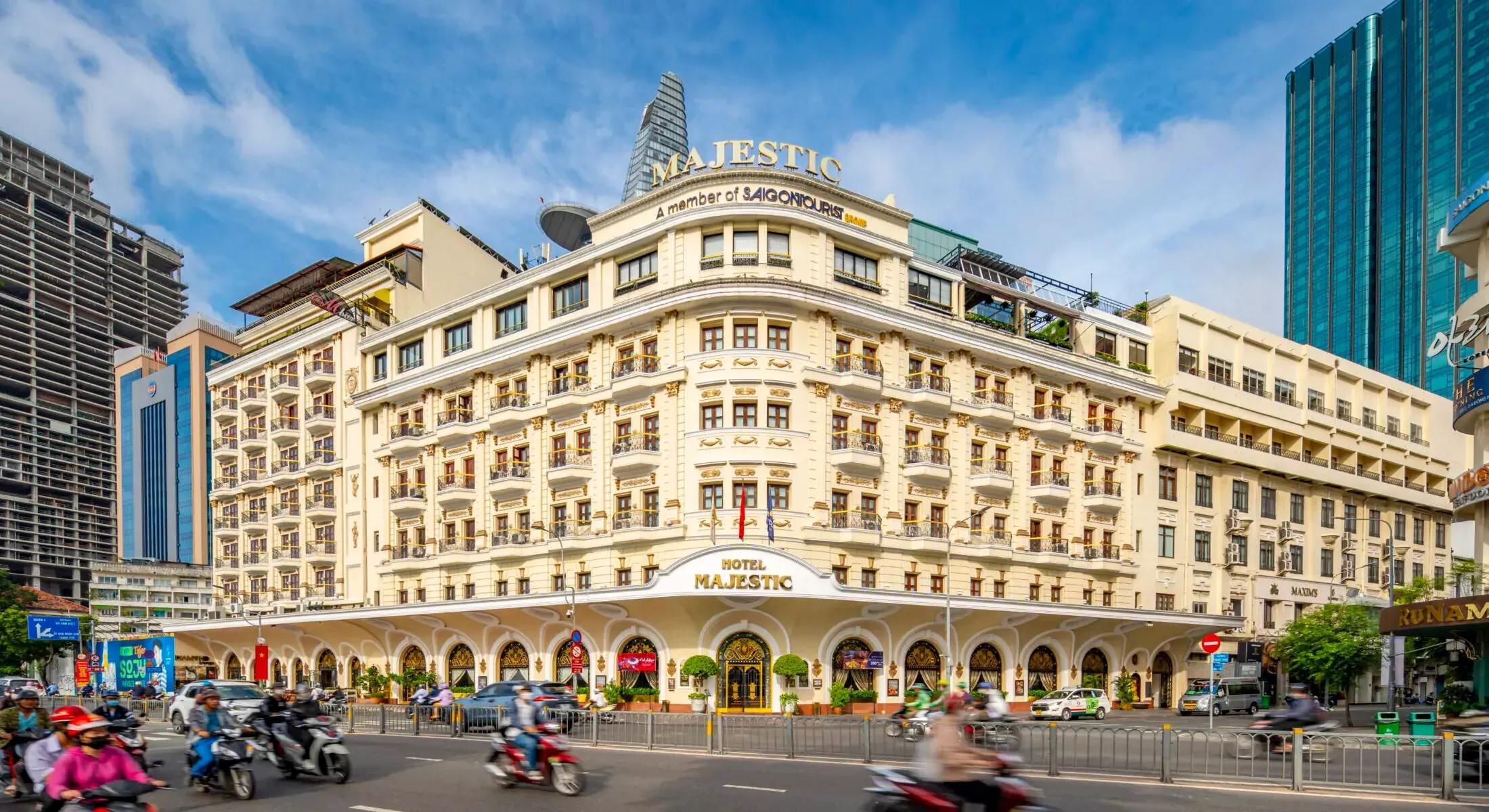 Hotel Majestic Saigon by the Saigon River, featuring classic French architecture.
