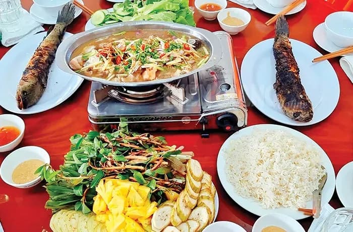Grilled and hotpot fish dishes in Ha Giang, a unique culinary experience.
