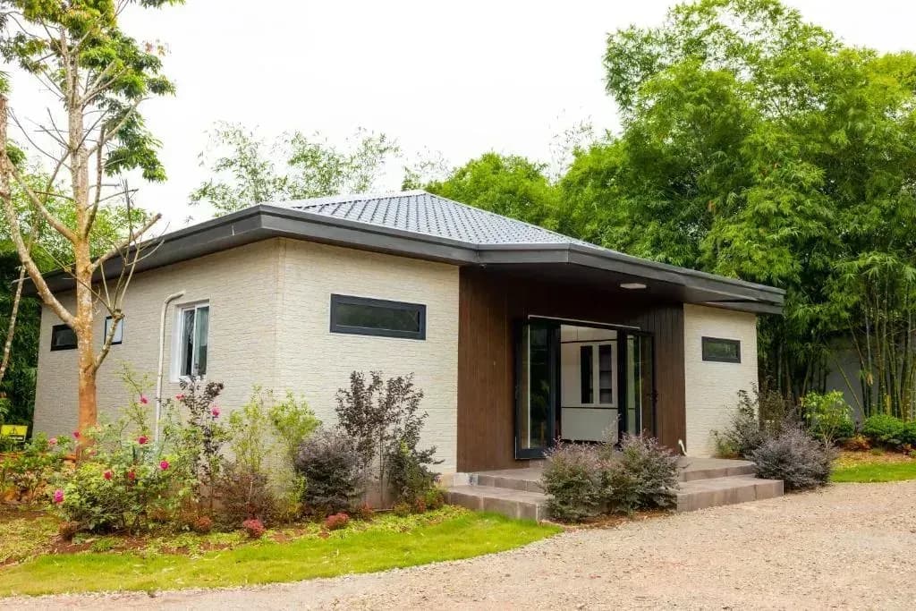 Minimalist cottage with lush garden.