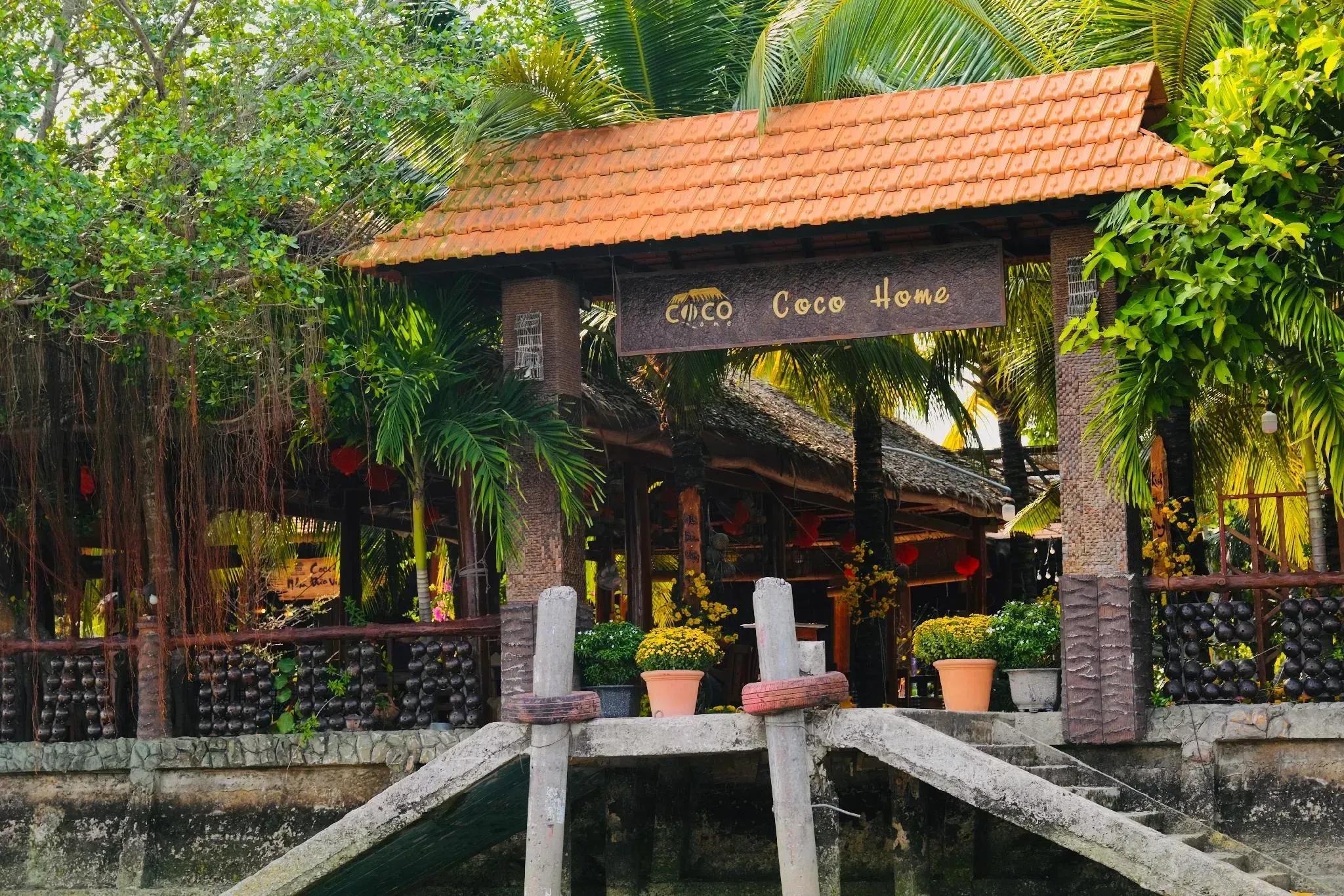 Eco-friendly entrance to Coco Home, surrounded by nature’s embrace.
