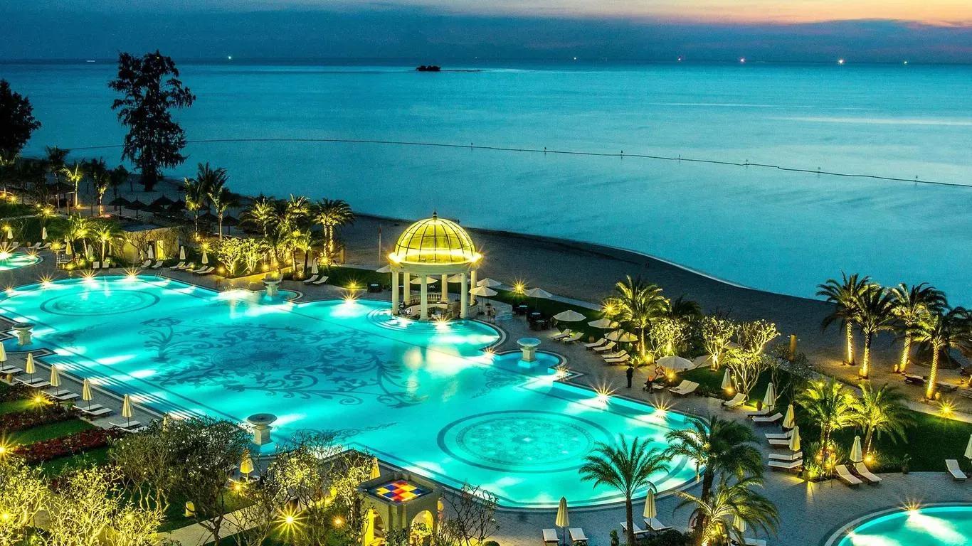 Stunning pool and beach views at sunset, blending nature with sophisticated design.