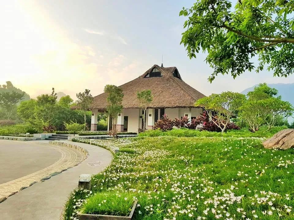 Charming cottage amidst lush greenery at An Lạc Resort.